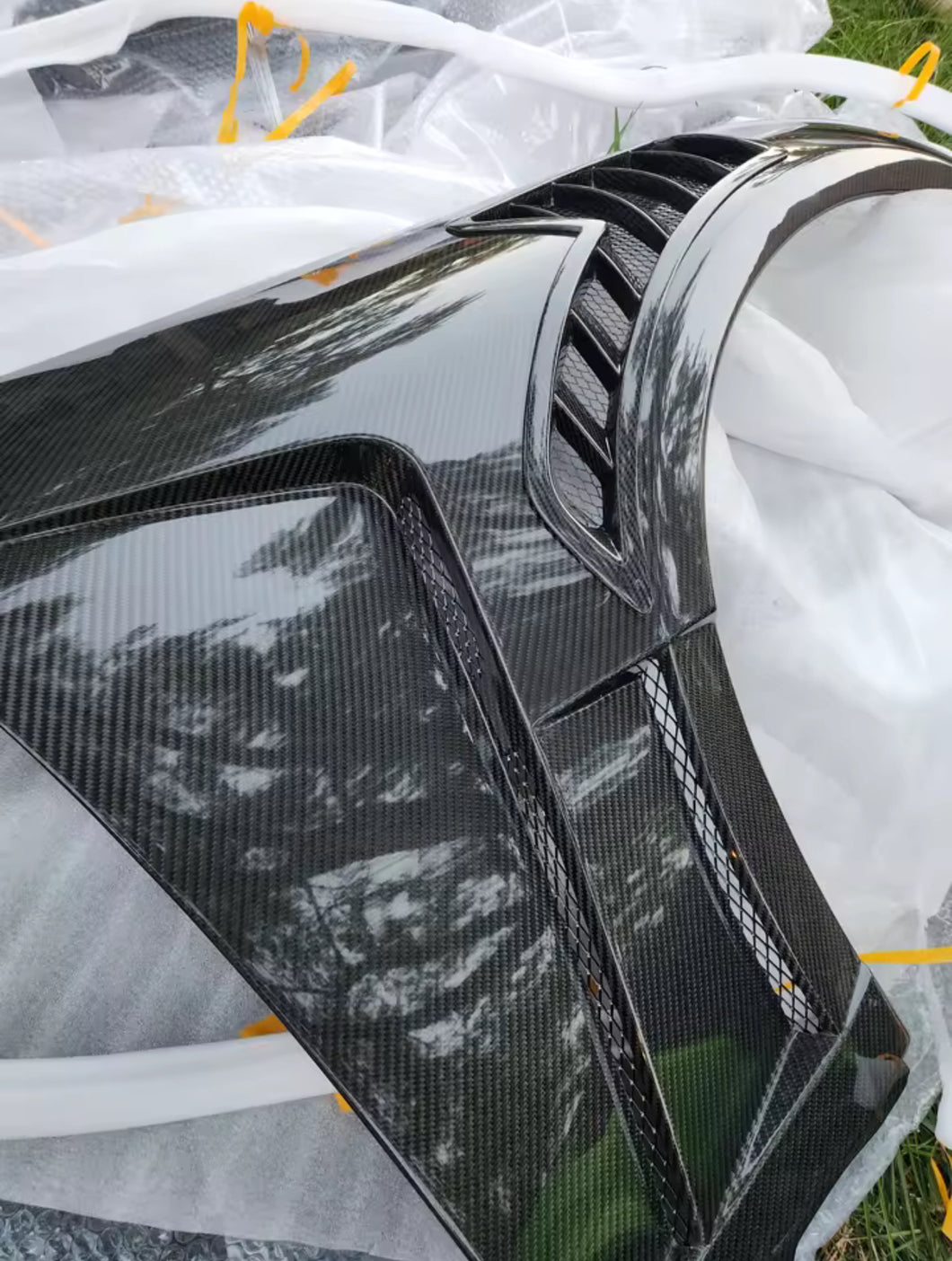 Infiniti G35 vented carbon fiber fenders
