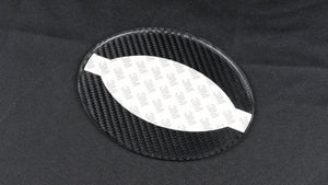 Fuel cover carbon
